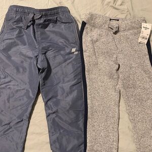 Two pair of sweatpants for boys size 4t and size 5.